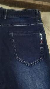 กางเกงยีนส์เดนิมทรงสลิมฟิตสีน้ำเงินเข้มคลาสสิกสำหรับผู้ชาย ผลิตจากผ้าคอตตอนผสมพรีเมียมที่ยืดหยุ่นได้ เพื่อความสบายและความยืดหยุ่นที่ดีขึ้น - Product Image 3