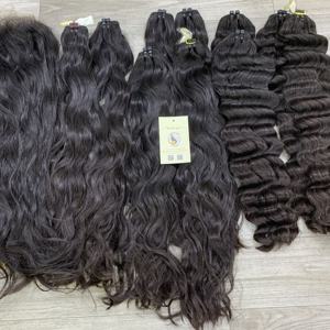 Extensiones de cabello humano vietnamita de onda profunda al por mayor, negro natural, ondulado natural, doble trama, cosidas a máquina, directamente de fábrica. - Product Image 5