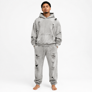 Chándal para hombre con efecto desgastado, tela suave, detalles de borde sin rematar y comodidad relajada para un estilo urbano moderno y uso diario. - Product Image 1