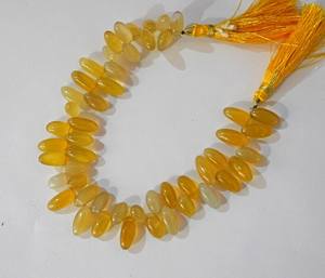 ลูกปัดหินแคลเซโดนีสีเหลืองธรรมชาติทรงข้าวเรียบ สำหรับทำเครื่องประดับ ขายส่ง - Product Image 5