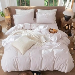 Ensemble de literie tissé blanc 4 pièces, couette et taies d'oreiller unies, linge de lit doux pour la maison - Product Image 1