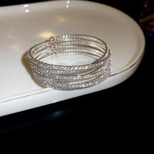 AMBER JEWELS Bracelet tennis unisexe Infinity avec diamant de laboratoire taille brillant serti griffe, plaqué or 10K, maillons de chaîne, classique pour usage quotidien - Product Image 1