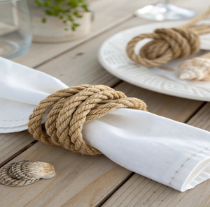 Nautical style coiled natural rope napkin <b>ring</b> in a <b>thick</b> knot design, available at wholesale prices for dining. - Product Image 1