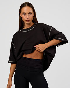 Camiseta de punto negra oversize para mujer con manga murciélago, cuello redondo, ajuste holgado, transpirable, de color liso, para todas las estaciones - Product Image 1
