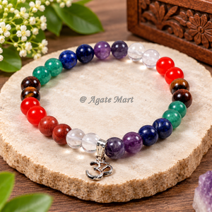 Bracelet en pierres précieuses des sept chakras le mieux noté, avec breloque Om, cristaux d'énergie pour l'équilibre des 7 chakras, bracelet gravé style Feng Shui EMF - Product Image 1