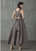 Robe longue élégante à coupe trapèze croisée sur le devant, style luxe sans manches, col en V, style urbain, bretelles spaghetti, taille empire, avec nœud décoratif