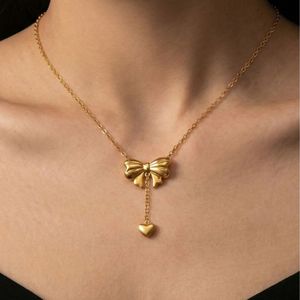 New Trendy Stainless Steel <b>Bow</b> Earrings and Necklace Set with Custom Packaging - Product Image 2