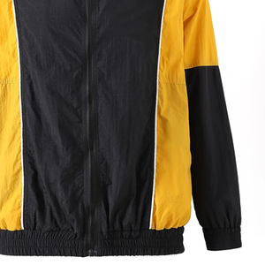Veste coupe-vent imperméable Alpha noire, jaune et blanche, entièrement zippée, légère, en polyester, avec poches cachées et fermeture éclair - Product Image 5
