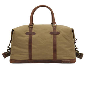 Premium Vintage Canvas Travel Duffle Bag Large Capacity Weekender with Genuine Leather Trim and Brass Hardware - Product Image 3