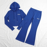 Ensemble de survêtement décontracté deux pièces pour femme, hiver, à capuche, coupe ajustée, en polyester épais, avec pantalon évasé et veste zippée