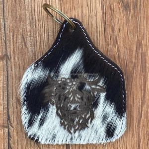 Vente en gros de porte-clés gravés au laser en cuir de vachette avec design personnalisé porte-clés de luxe en cuir véritable cadeaux promotionnels - Product Image 4