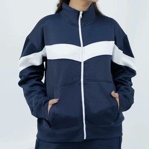 Veste de survêtement pour femme bleu marine avec blocs de couleur et fermeture éclair, à rayures blanches, manches longues, col montant, design sportif, pour l'automne - Product Image 1