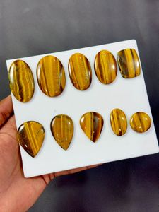 Pierre précieuse œil de tigre de qualité export, cabochon naturel pour la création de bijoux, la décoration intérieure et les objets de collection, disponible en grande quantité. - Product Image 2