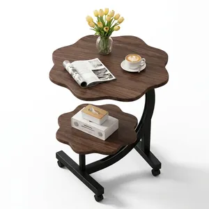 Table basse vintage avec deux plateaux en bois sculpté, structure en métal noir courbé et design décoratif raffiné - Product Image 3