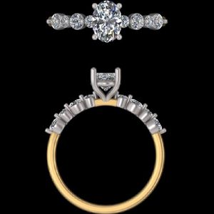 Sophisticated 1.13 Carat Oval Diamond Engagement <b>Ring</b> with Graduated Round Side <b>Stones</b> in Elegant <b>Two</b> Tone Gold Bridal Design - Product Image 2