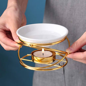 Elegantes quemadores de fragancias para el hogar en color dorado, portavelas de metal para velas de té, quemador de aceite esencial, difusor de aroma para sala de estar y dormitorio. - Product Image 4