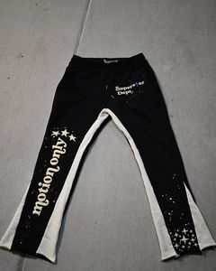 Pantalones deportivos negros para hombre con franja lateral blanca y estampado de estrellas, cintura elástica con cordón, joggers informales para otoño - Product Image 4