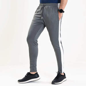 Pantalon de survêtement gris pour homme avec taille élastique et cordon de serrage, rayures latérales, décontracté, léger, séchage rapide, idéal pour le printemps - Product Image 1
