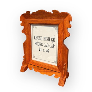 The picture <b>frame</b> is made of fragrant wood, with a simple design and dimensions of 21x26 cm. - Product Image 1