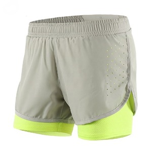 Shorts de sport 2-en-1 personnalisés OEM pour femmes, séchage rapide, entraînement, course à pied, avec doublure intérieure moulante, poches et taille élastique - Product Image 1