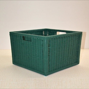 Deep forest green <b>cube</b>-shaped woven plastic storage <b>basket</b> featuring a tight weave pattern and integrated side cut-out handles. - Product Image 1