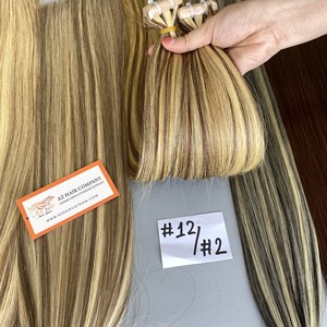 Extensiones de cabello humano vietnamita crudo de calidad superior de grado 12A varios colores con cinta de pelo liso vendedor al por mayor - Product Image 1
