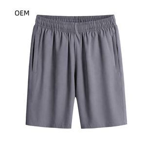 กางเกงวิ่งผู้ชายแบบแห้งเร็ว OEM ODM ผลิตตามสั่ง น้ำหนักเบา ระบายอากาศดี เหมาะสำหรับออกกำลังกายและเล่นกีฬา มีกระเป๋า ผ้าฝ้ายแท้ 100% สีพื้น - Product Image 3