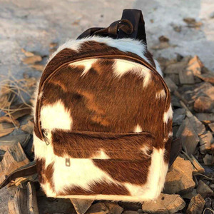 Luxury handmade cowhide leather hair on school <b>backpacks</b> wholesale supplier OEM custom export student bags in affordable price - Product Image 5