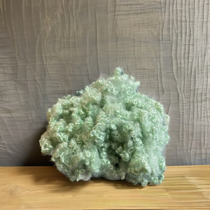 Fibra de poliéster hueca conjugada de alta calidad 15D HC verde grado A 100% poliéster GRS fiberfix para relleno de juguetes, almohadas y mantas - Product Image 1