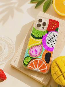 Carteras de mano y fundas para teléfono de diseño, talladas a mano y con adornos de plata y oro, para mujer, con borlas de pelo de piel y pintura hecha a mano, únicas y directas. - Product Image 1
