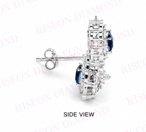 Pendientes colgantes de lujo en oro blanco de 18 quilates con piedras centrales de corte almohadilla en azul real, rodeadas por un intrincado detalle de halo de diamantes. - Product Image 4