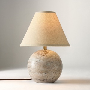 Solución de iluminación para mesa de piedra refinada que ofrece una geometría redondeada artística, artesanía de primera calidad e iluminación ambiental suave. - Product Image 3
