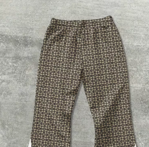 Pantalon de survêtement imprimé pour homme avec bande latérale, taille élastique et cordon de serrage, décontracté, respirant, en mélange de coton et élasthanne tricoté, idéal pour le printemps - Product Image 6
