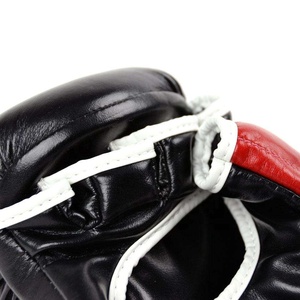ถุงมือชกมวยหนังแท้ Fairtex สีแดงคุณภาพสูงแบบสั่งทำพิเศษ พร้อมสายรัดแบบ Hook & Loop กันลื่น ปิดนิ้วเต็มรูปแบบ สำหรับมวยไทยและการต่อสู้แบบสตรีทไฟท์ - Product Image 6