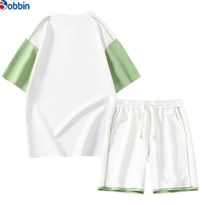 Conjunto de camiseta de manga corta con bloques de color blanco y verde para hombre, conjunto informal de verano, pantalones cortos de punto transpirables, ajuste holgado, unisex. - Product Image 1