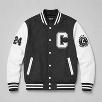Veste varsity Champion pour homme, noire et blanche, avec patch brodé, coupe classique, style preppy, pour l'automne.