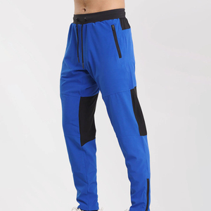 Pantalon de jogging pour homme bleu marine, taille élastique, poches latérales zippées, bas de pantalon côtelé, pantalon sportif - Product Image 1