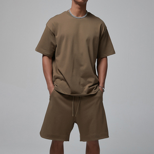 ชุดเสื้อยืดและกางเกงขาสั้นผู้ชายสำหรับฤดูร้อน ระบายอากาศได้ดี 2 ชิ้น คุณภาพสูง สวมใส่สบาย ผลิตจากโพลีเอสเตอร์/คอตตอน - Product Image 1