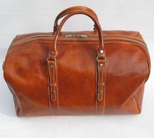 กระเป๋าเดินทางหนังแท้สำหรับผู้ชายรุ่นใหม่ล่าสุด กันน้ำ ราคาถูก ขายออนไลน์ - Product Image 1