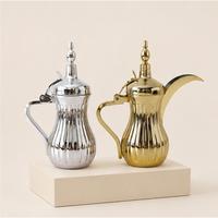 Cafetière arabe de luxe en acier inoxydable Dallah avec bec en bec d'aigle, théière traditionnelle dorée polie du Moyen-Orient pour hôtel