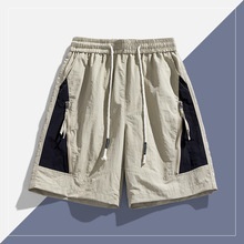 Nuevos shorts de hombre High Street con estilo, juveniles y a la moda, con cordón flotante, estampado de cinco puntos, esenciales, shorts americanos flocados. - Product Image 3