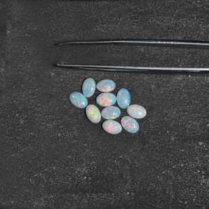 หินโอปอลสีรุ้งธรรมชาติขนาด6มม. 8มม. โอปอลทรงแบนเรียบรูปวงรีทรงแบนเรียบขายส่งโดยไม่ต้องเสียภาษี - Product Image 4