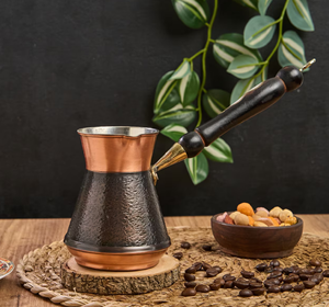 Charming bulbous copper pot with wavy <b>engravings</b>, accompanied by a crafted wooden spoon. Available at wholesale price. - Product Image 5