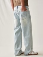 Jean en denim vintage coupe slim taille mi-haute jambe droite écoresponsable Abdul Royal World Export avec poches latérales et détail ceinture, délavage clair - Product Image 3
