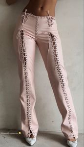 Pantalones de invierno de cuero genuino rosa, de cintura alta, ajustados, formales, con cordones laterales huecos, cierre de botones y diseño ecológico. - Product Image 3