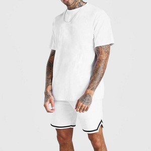 เสื้อยืดถักลายปักดีไซน์ใหม่ ผ้าฝ้าย 100% ชุดเซ็ตคู่สำหรับฤดูร้อน เนื้อผ้าหนา แห้งเร็ว ชุดสูทผู้ชาย - Product Image 2