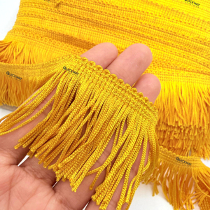 Ribete de encaje dorado con flecos y borlas para coser, ideal para ropa DIY y decoración del hogar - Product Image 1