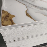 Vente en gros de feuilles de marbre PVC UV à production rapide, surface marbrée, très demandées