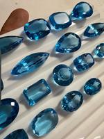 Lot de topazes bleues suisses ovales et taille coussin facettées pour la fabrication de bijoux chez BU GEMS, 100 % naturelles, certifiées par un tiers