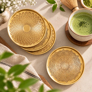 Circular textured brass coaster featuring a central floral stem design and a <b>beaded</b> rim, available at wholesale prices. - Product Image 6